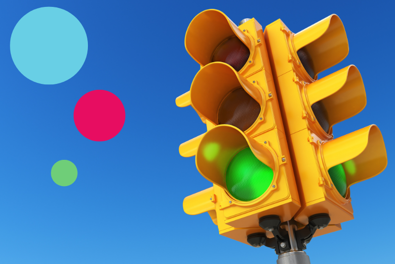 Yellow traffic lights on green