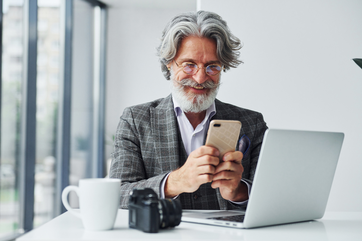 businessman-office-senior-stylish-modern-man-with-grey-hair-beard-indoors-1